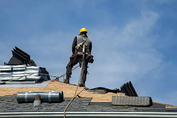 Professional Roofing technician working in Taftville, CT